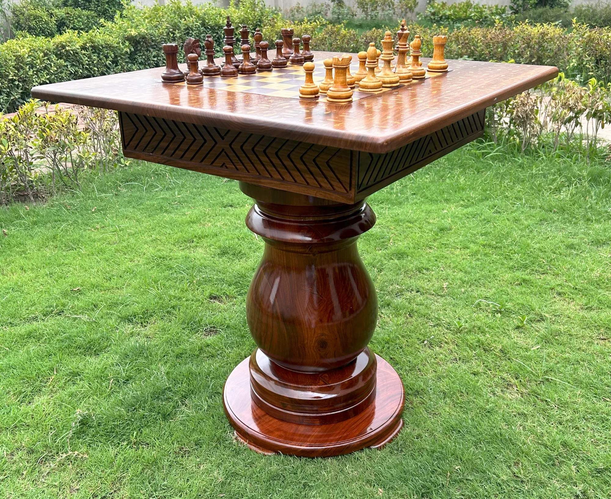 An illuminated epoxy-and-wood chess table, a limited collector edition