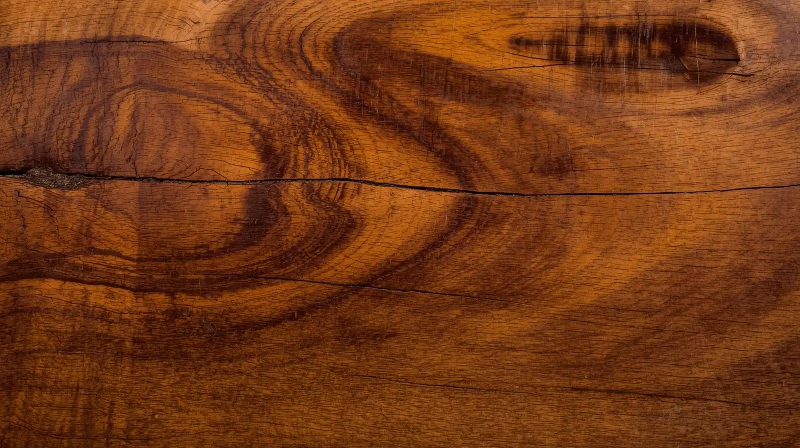 Rosewood timber with amber and ink streaks